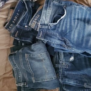 4 pairs of men's American Eagle Jeans